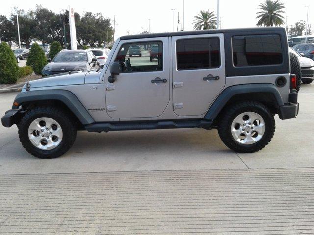 used 2013 Jeep Wrangler Unlimited car, priced at $19,556