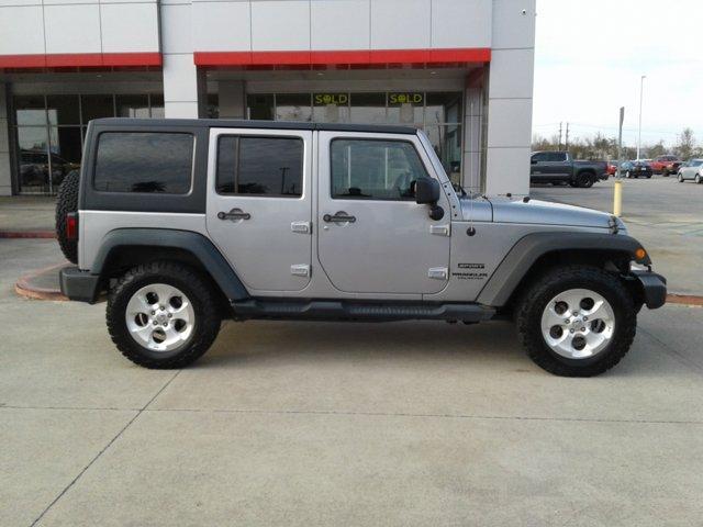 used 2013 Jeep Wrangler Unlimited car, priced at $19,556