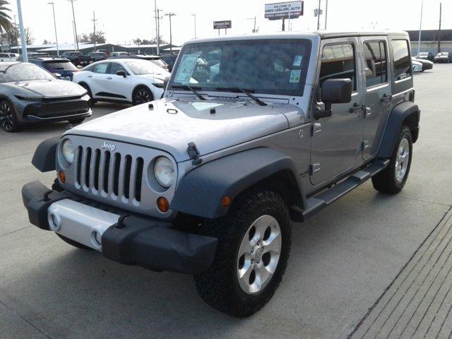 used 2013 Jeep Wrangler Unlimited car, priced at $19,556