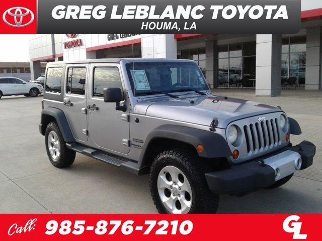 used 2013 Jeep Wrangler Unlimited car, priced at $19,556