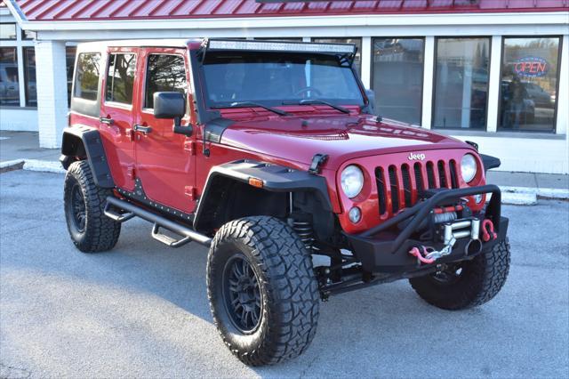 used 2014 Jeep Wrangler Unlimited car, priced at $19,999