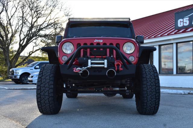 used 2014 Jeep Wrangler Unlimited car, priced at $19,999