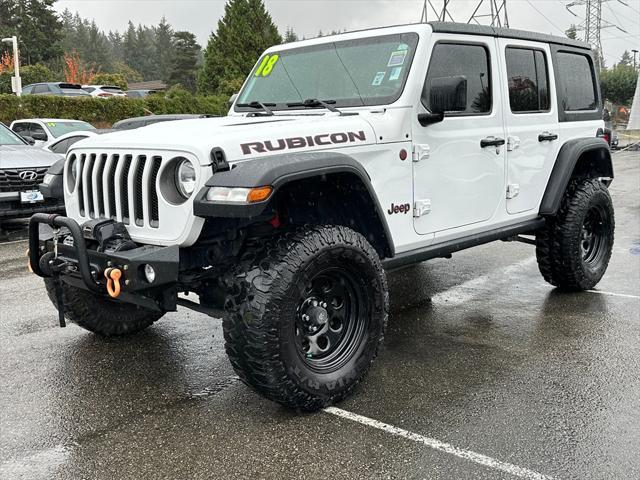 used 2018 Jeep Wrangler Unlimited car, priced at $33,059