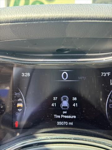 used 2021 Jeep Grand Cherokee car, priced at $35,572
