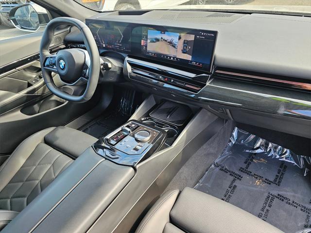 used 2024 BMW 530 car, priced at $44,204