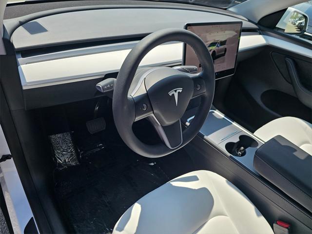 used 2023 Tesla Model Y car, priced at $32,998