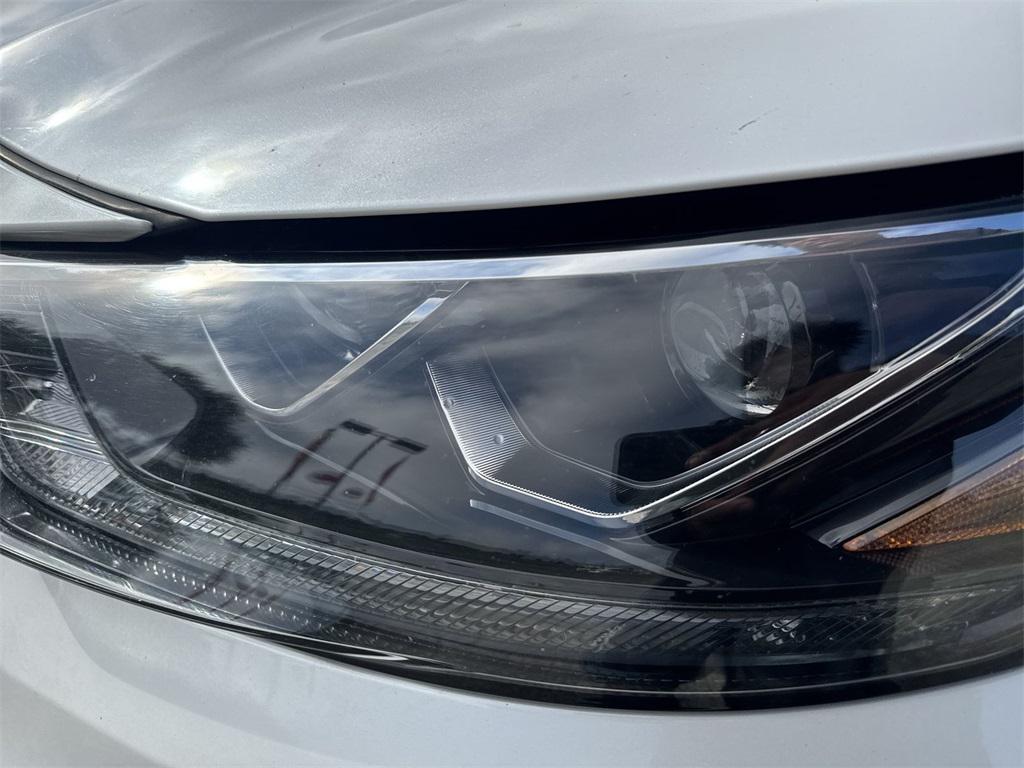 used 2020 Toyota Highlander Hybrid car, priced at $28,722
