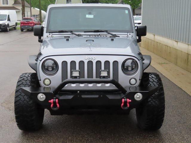 used 2014 Jeep Wrangler Unlimited car, priced at $11,998