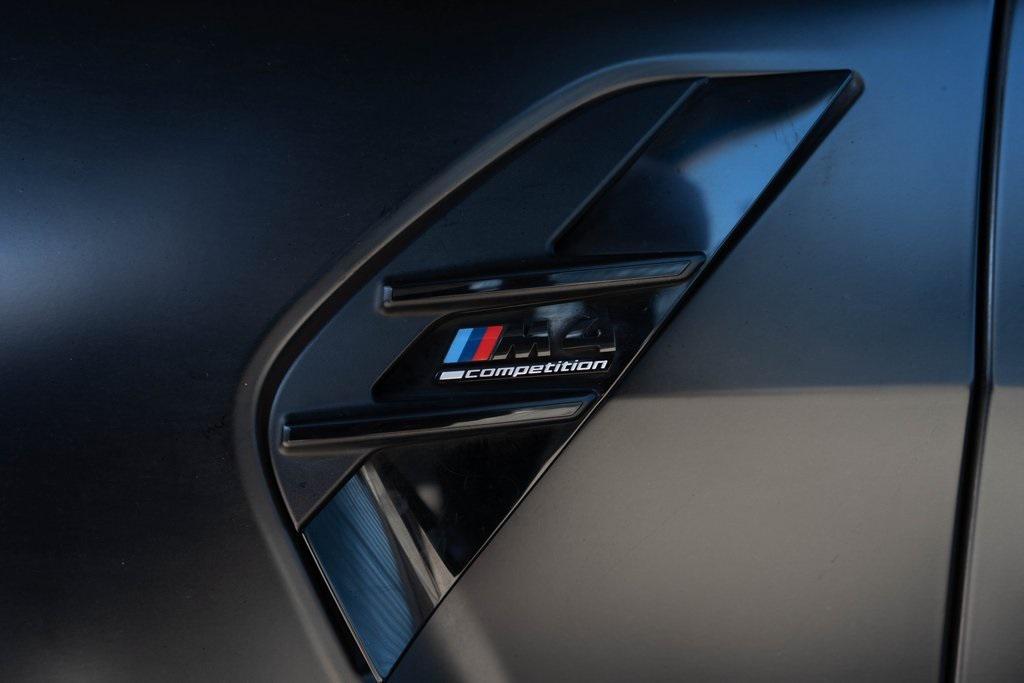 used 2024 BMW M4 car, priced at $75,631