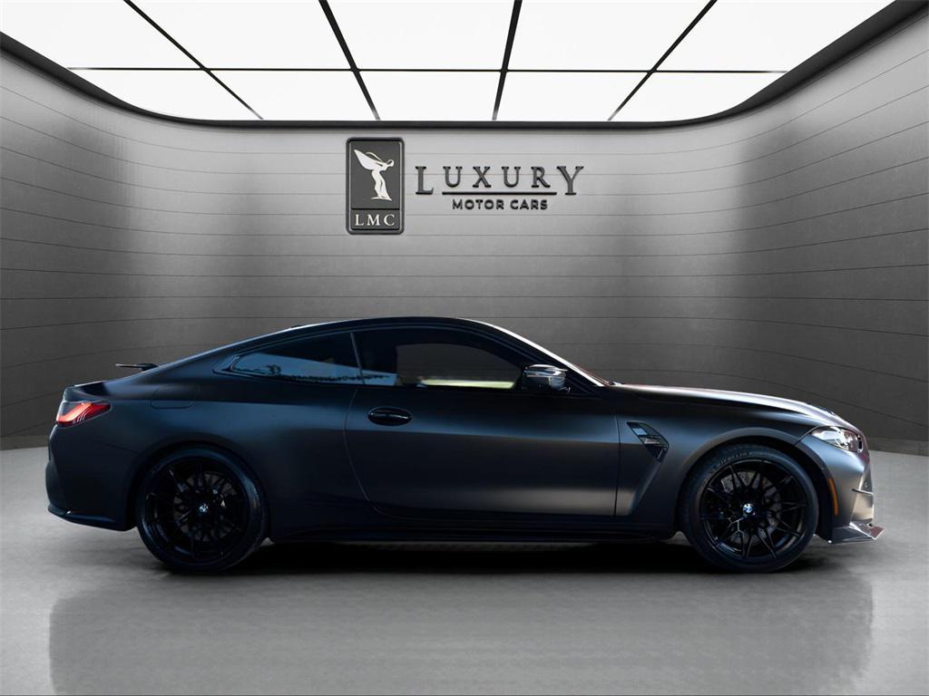 used 2024 BMW M4 car, priced at $75,631