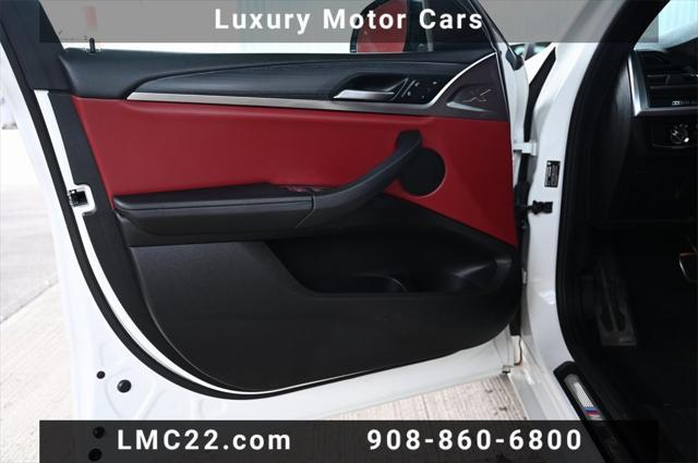 used 2022 BMW X4 car, priced at $35,397