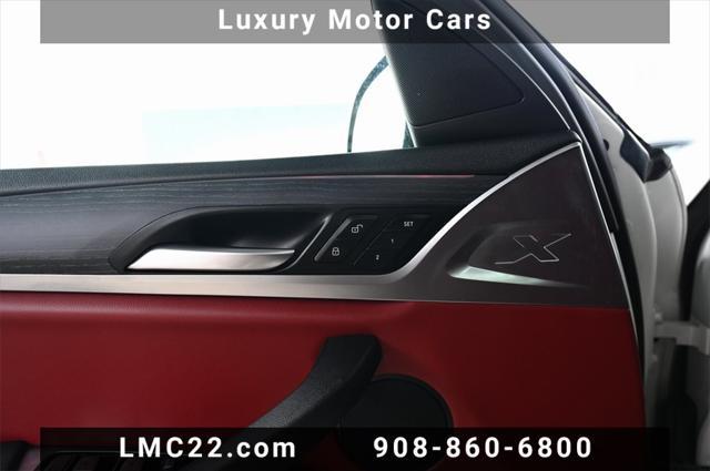 used 2022 BMW X4 car, priced at $35,397