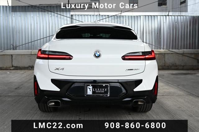 used 2022 BMW X4 car, priced at $35,397