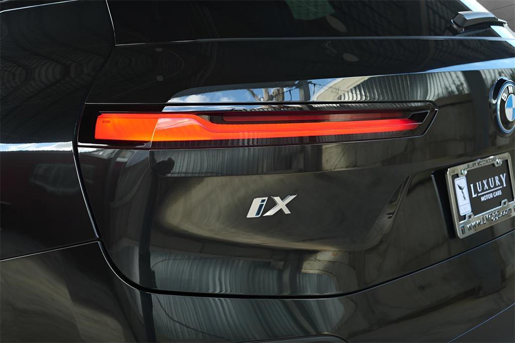 used 2024 BMW iX car, priced at $38,345