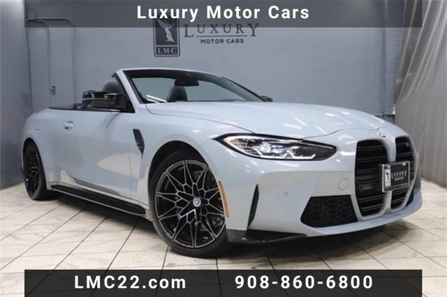 used 2023 BMW M4 car, priced at $67,555
