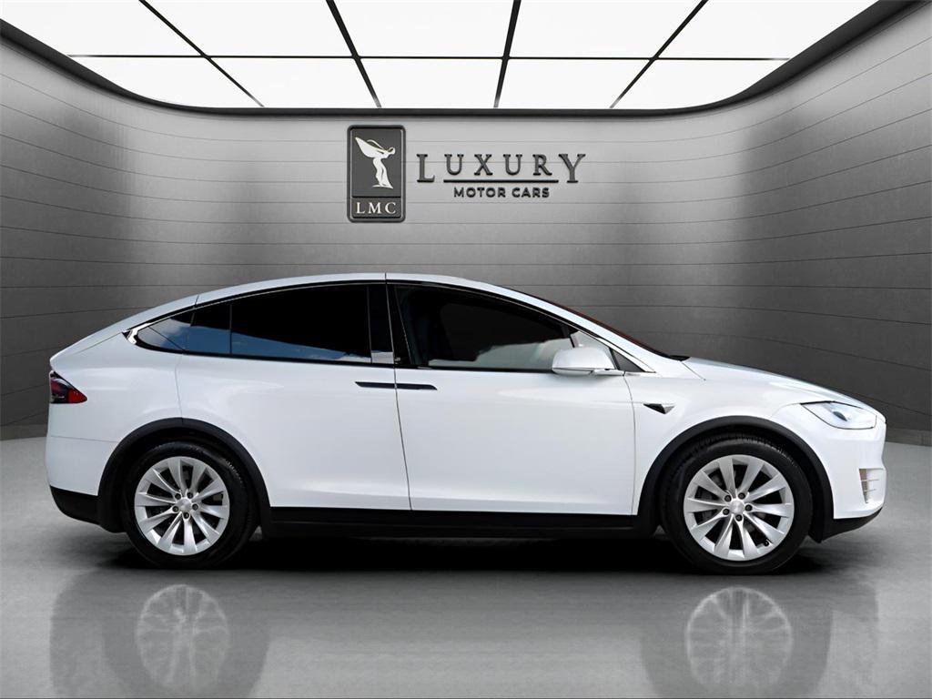 used 2018 Tesla Model X car, priced at $22,621