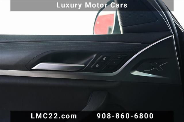 used 2022 BMW X4 car, priced at $30,763