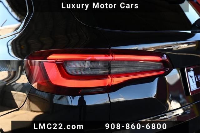used 2021 BMW X5 M car, priced at $55,892