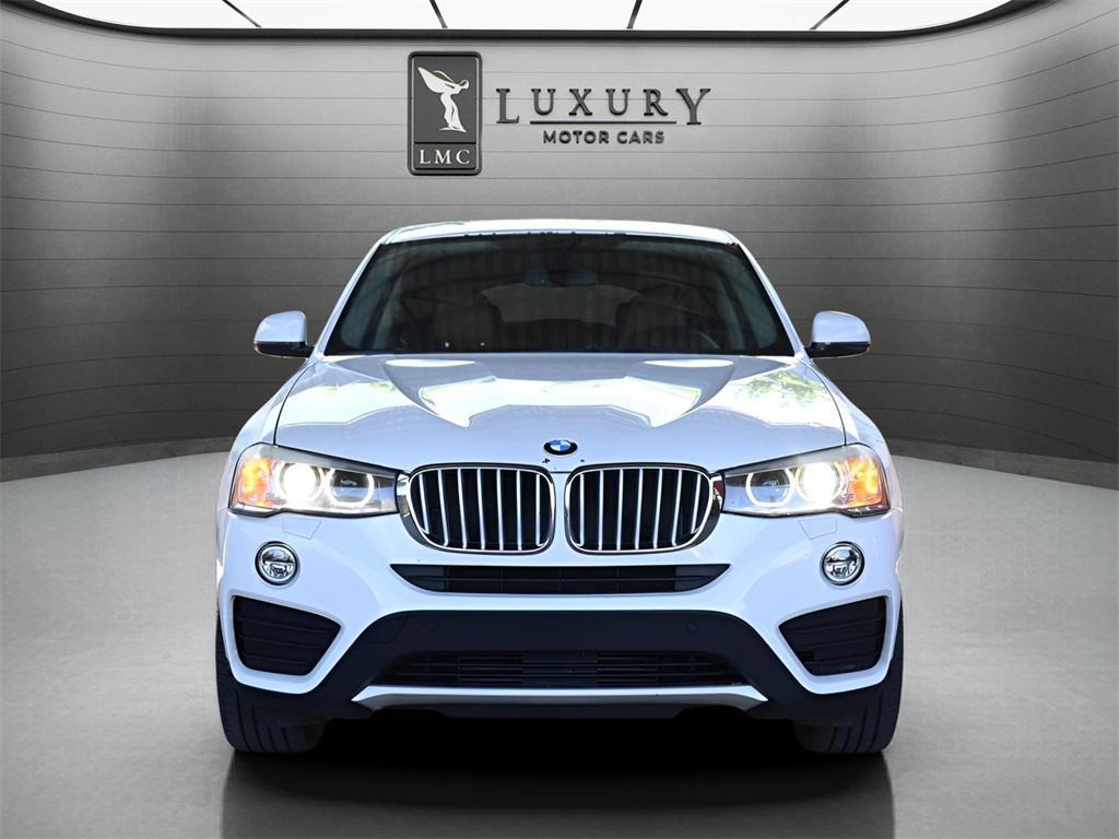 used 2015 BMW X4 car, priced at $17,321