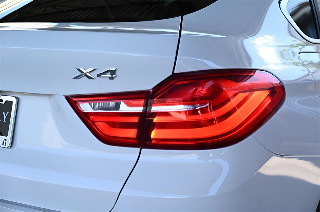 used 2015 BMW X4 car, priced at $17,321