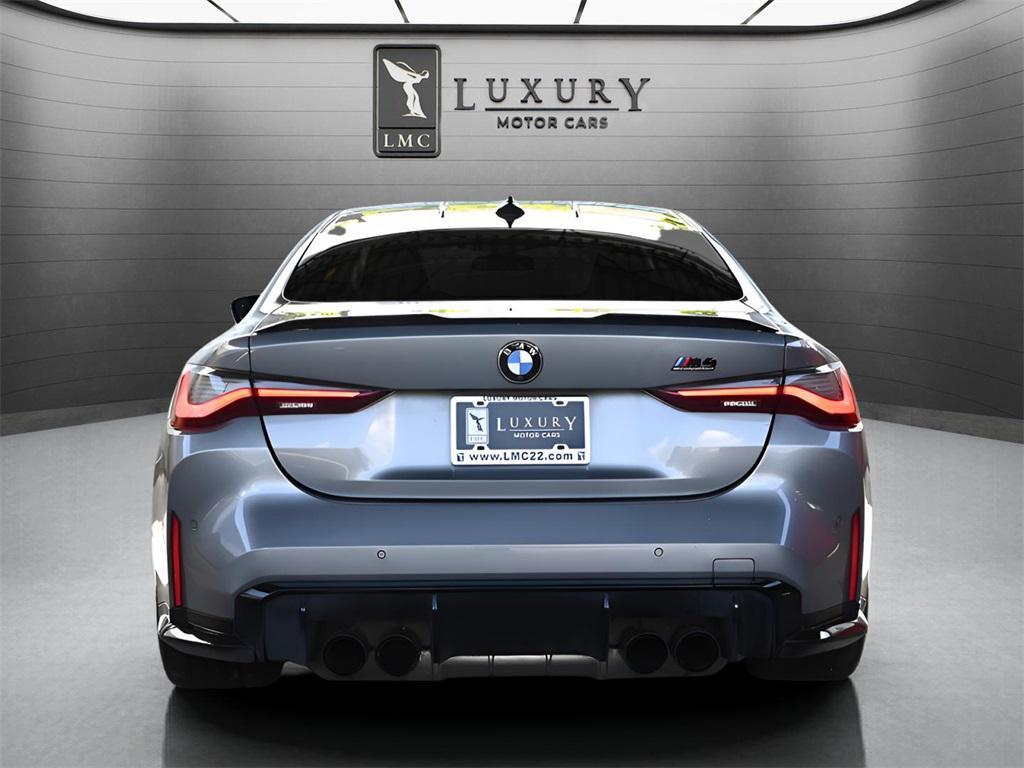 used 2022 BMW M4 car, priced at $62,894