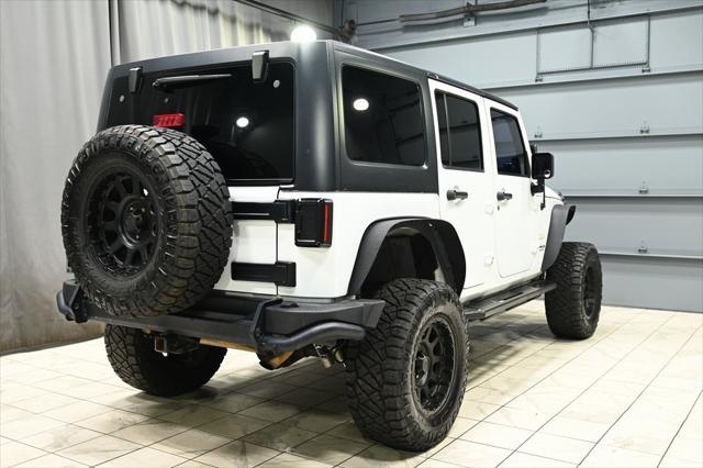 used 2013 Jeep Wrangler Unlimited car, priced at $15,650