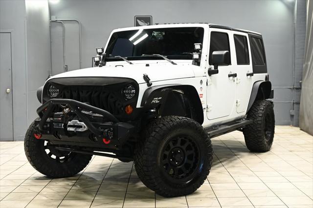 used 2013 Jeep Wrangler Unlimited car, priced at $15,650