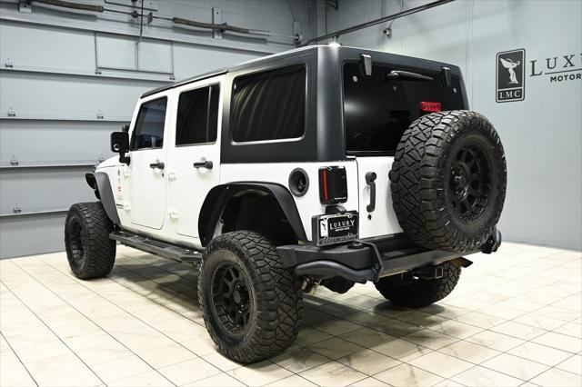 used 2013 Jeep Wrangler Unlimited car, priced at $15,650