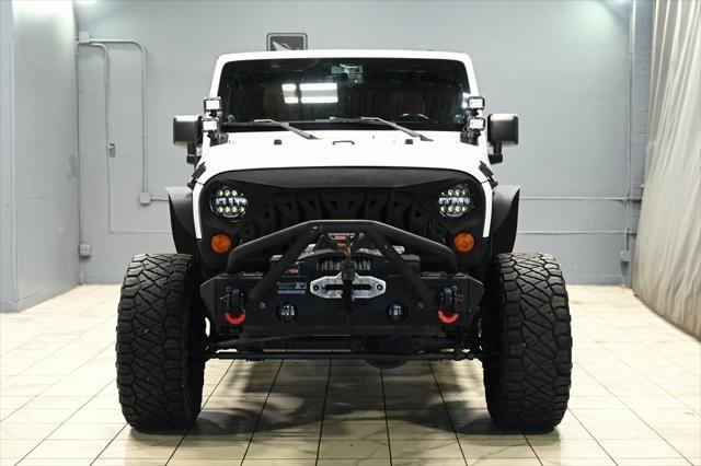 used 2013 Jeep Wrangler Unlimited car, priced at $15,650