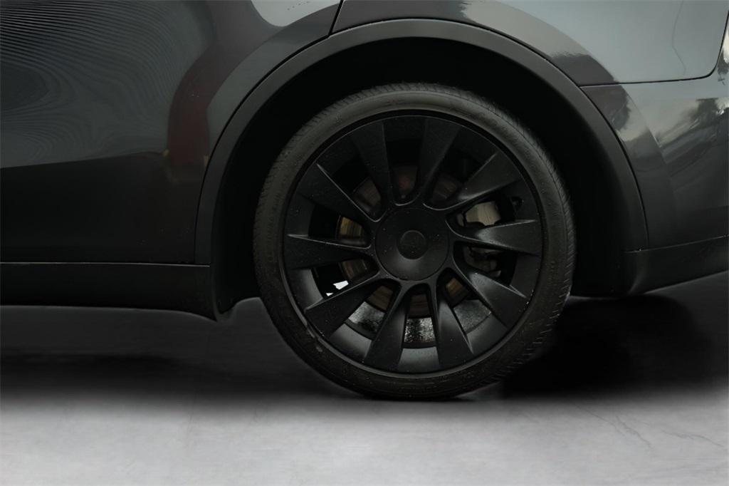 used 2024 Tesla Model Y car, priced at $27,957