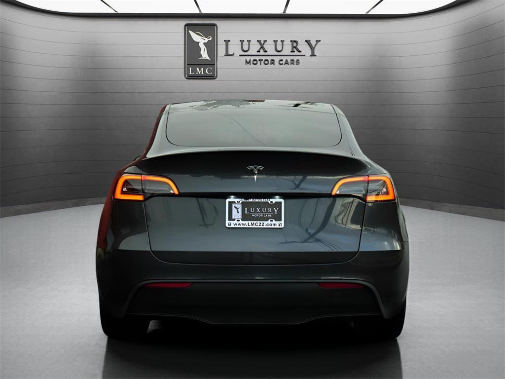 used 2024 Tesla Model Y car, priced at $27,957