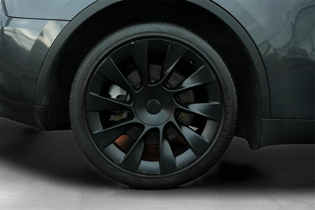 used 2024 Tesla Model Y car, priced at $27,957