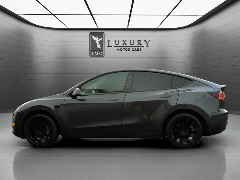 used 2024 Tesla Model Y car, priced at $27,957