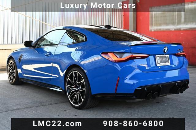used 2024 BMW M4 car, priced at $74,894