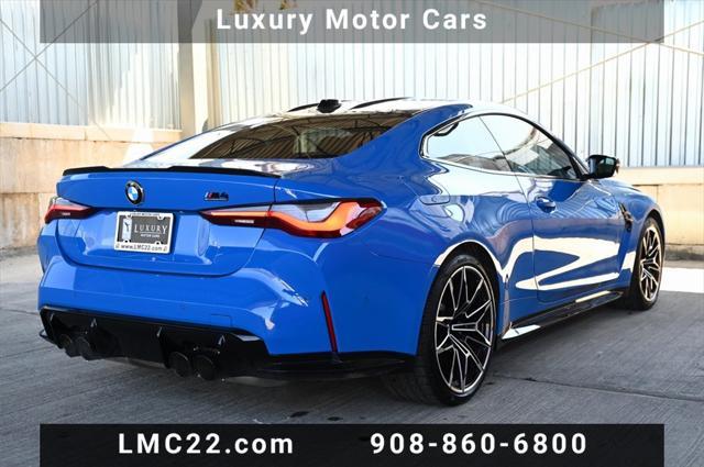 used 2024 BMW M4 car, priced at $74,894
