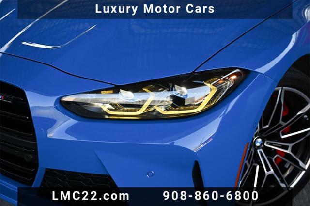 used 2024 BMW M4 car, priced at $74,894