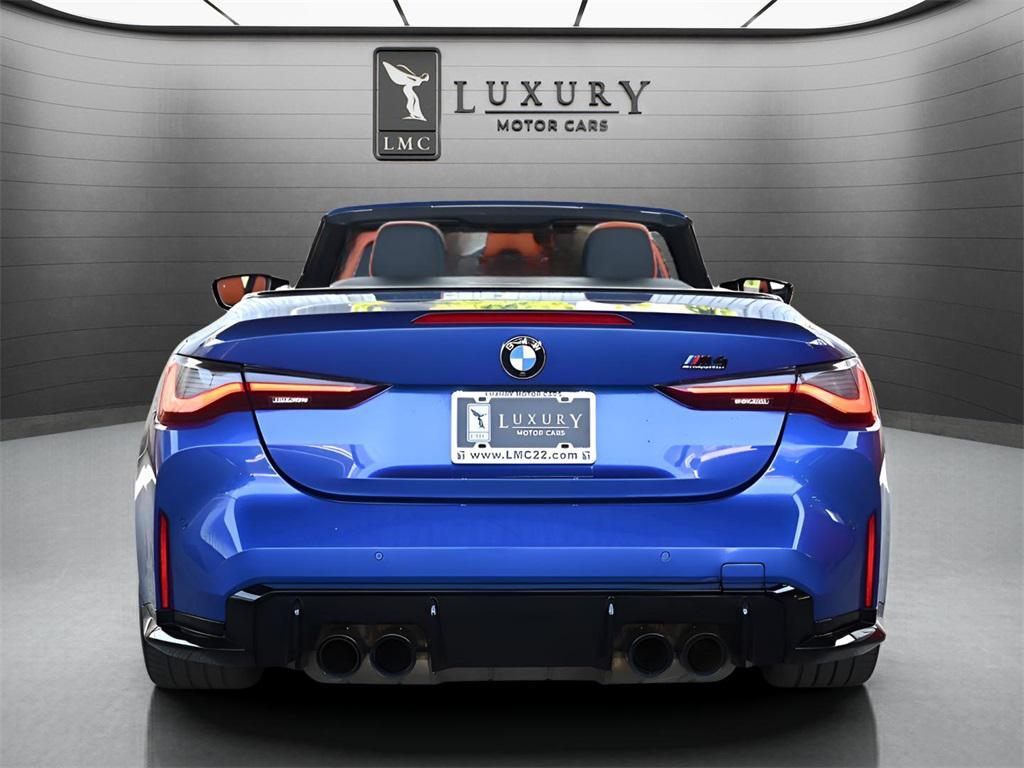 used 2022 BMW M4 car, priced at $60,892