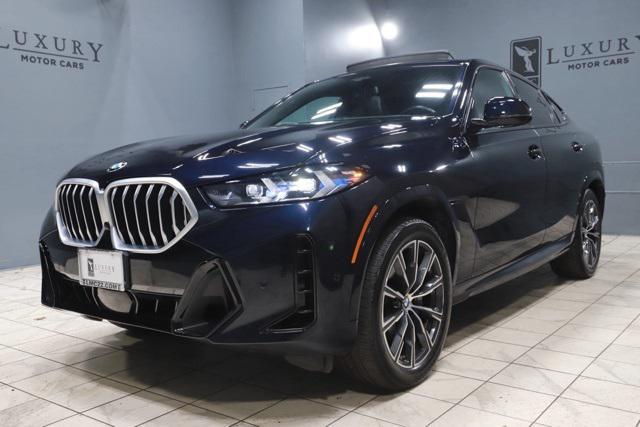 used 2024 BMW X6 car, priced at $57,388