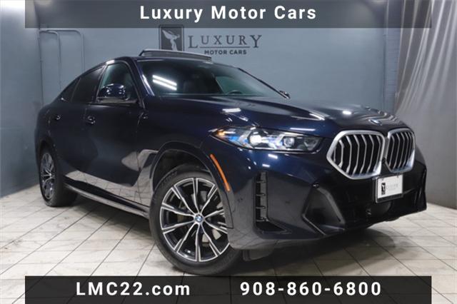 used 2024 BMW X6 car, priced at $57,388