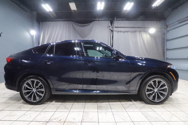 used 2024 BMW X6 car, priced at $57,388