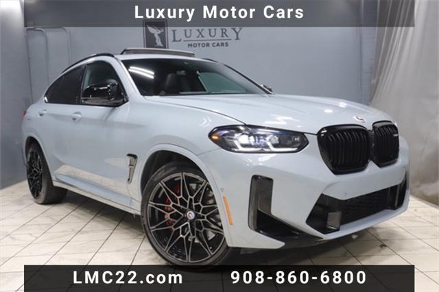 used 2023 BMW X4 M car, priced at $70,333