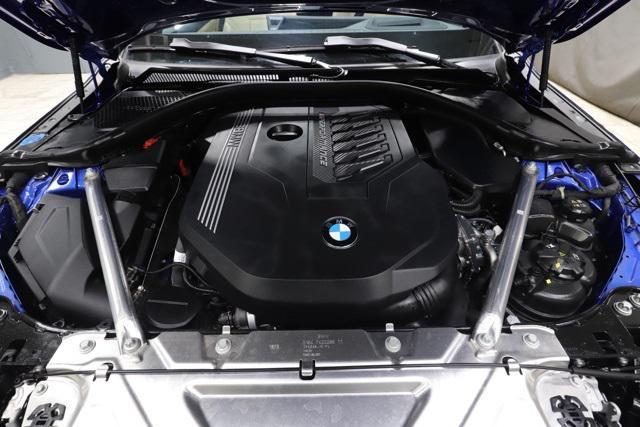 used 2024 BMW M4 car, priced at $55,333