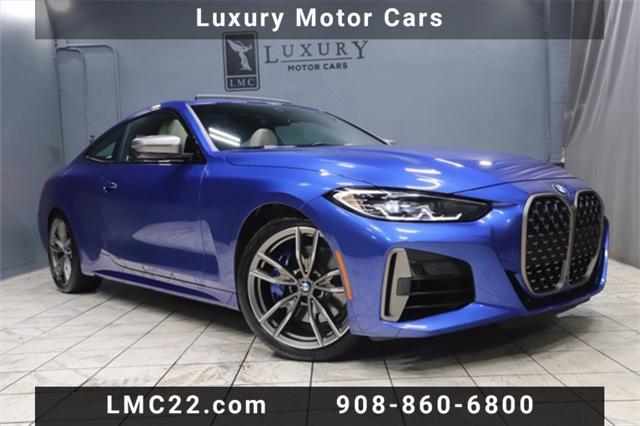 used 2024 BMW M4 car, priced at $55,333