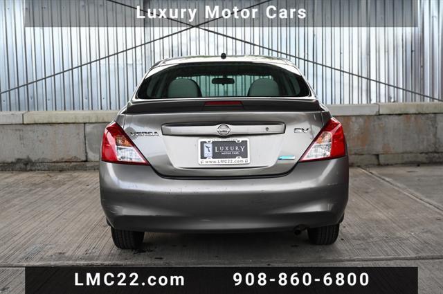 used 2013 Nissan Versa car, priced at $5,494