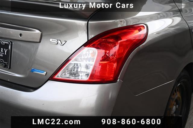 used 2013 Nissan Versa car, priced at $5,494