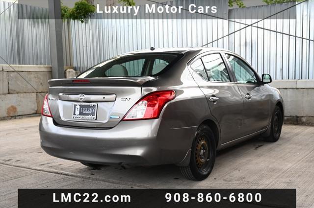 used 2013 Nissan Versa car, priced at $5,494