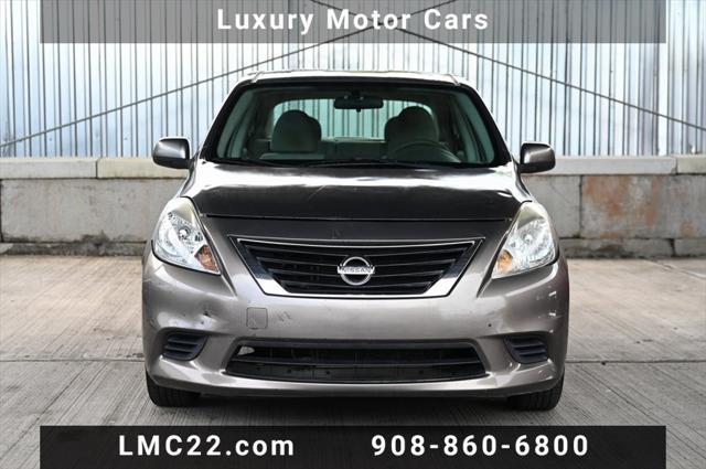 used 2013 Nissan Versa car, priced at $5,494