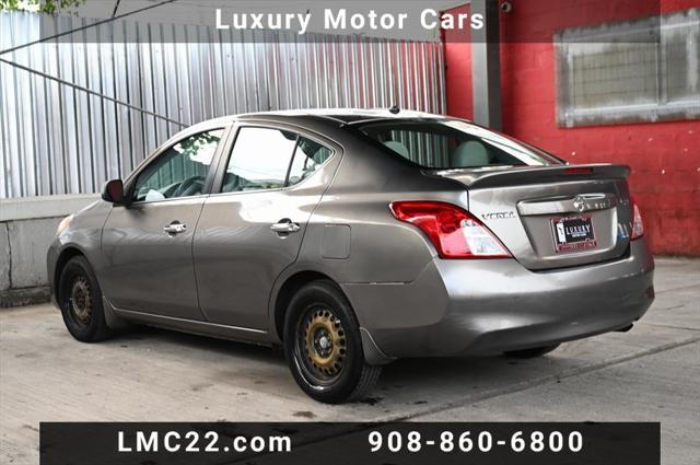 used 2013 Nissan Versa car, priced at $5,494