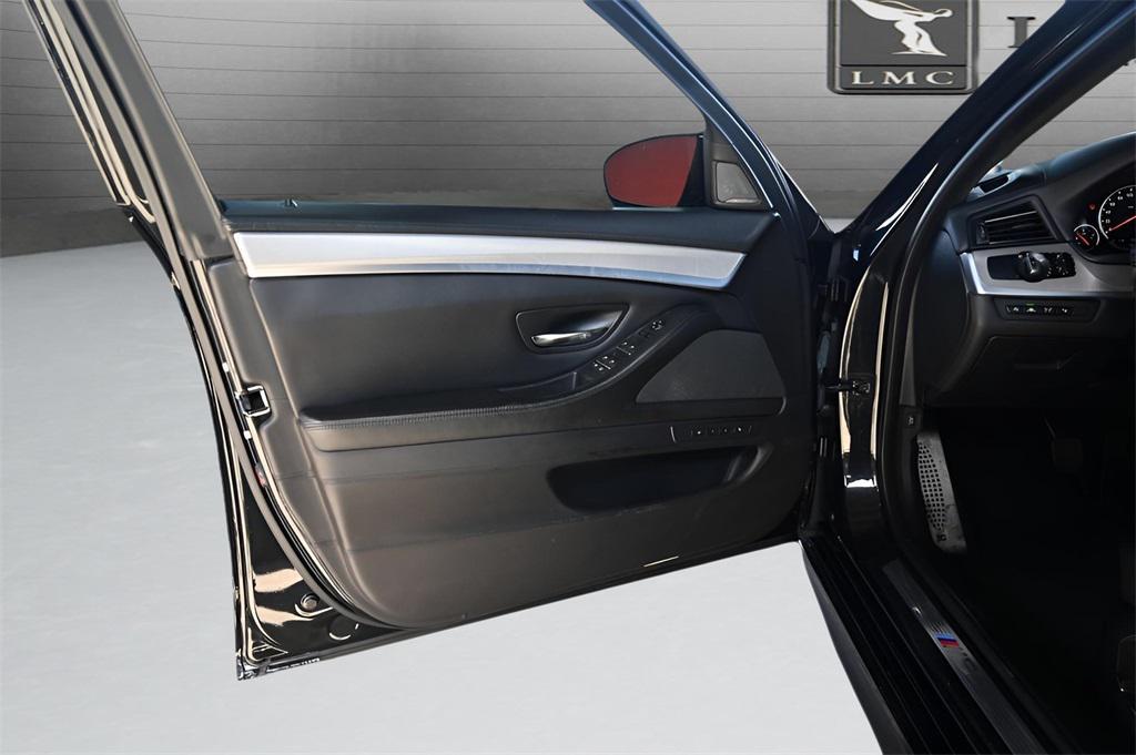 used 2015 BMW M5 car, priced at $22,289