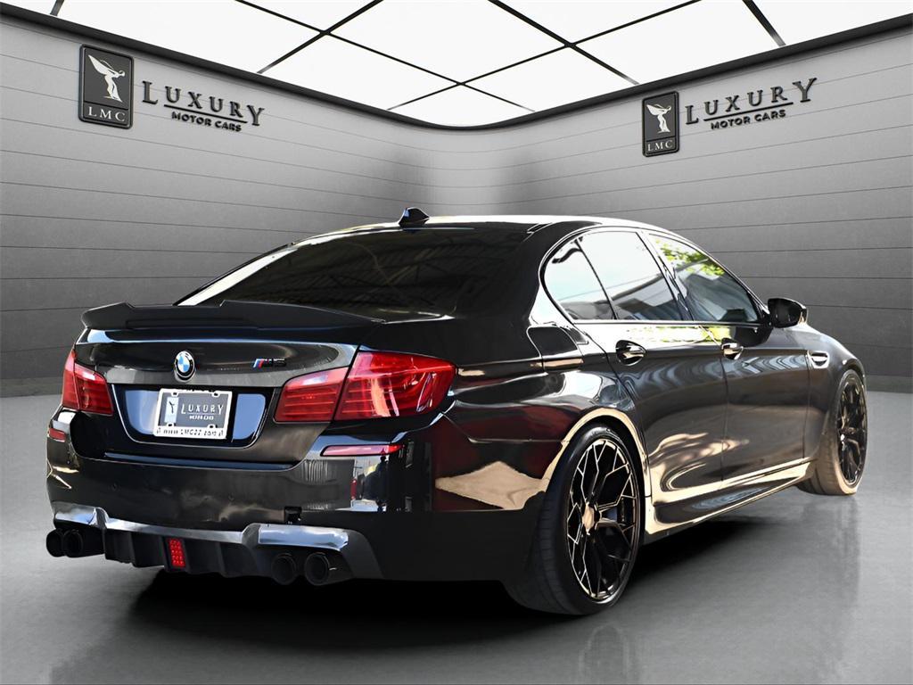 used 2015 BMW M5 car, priced at $22,289